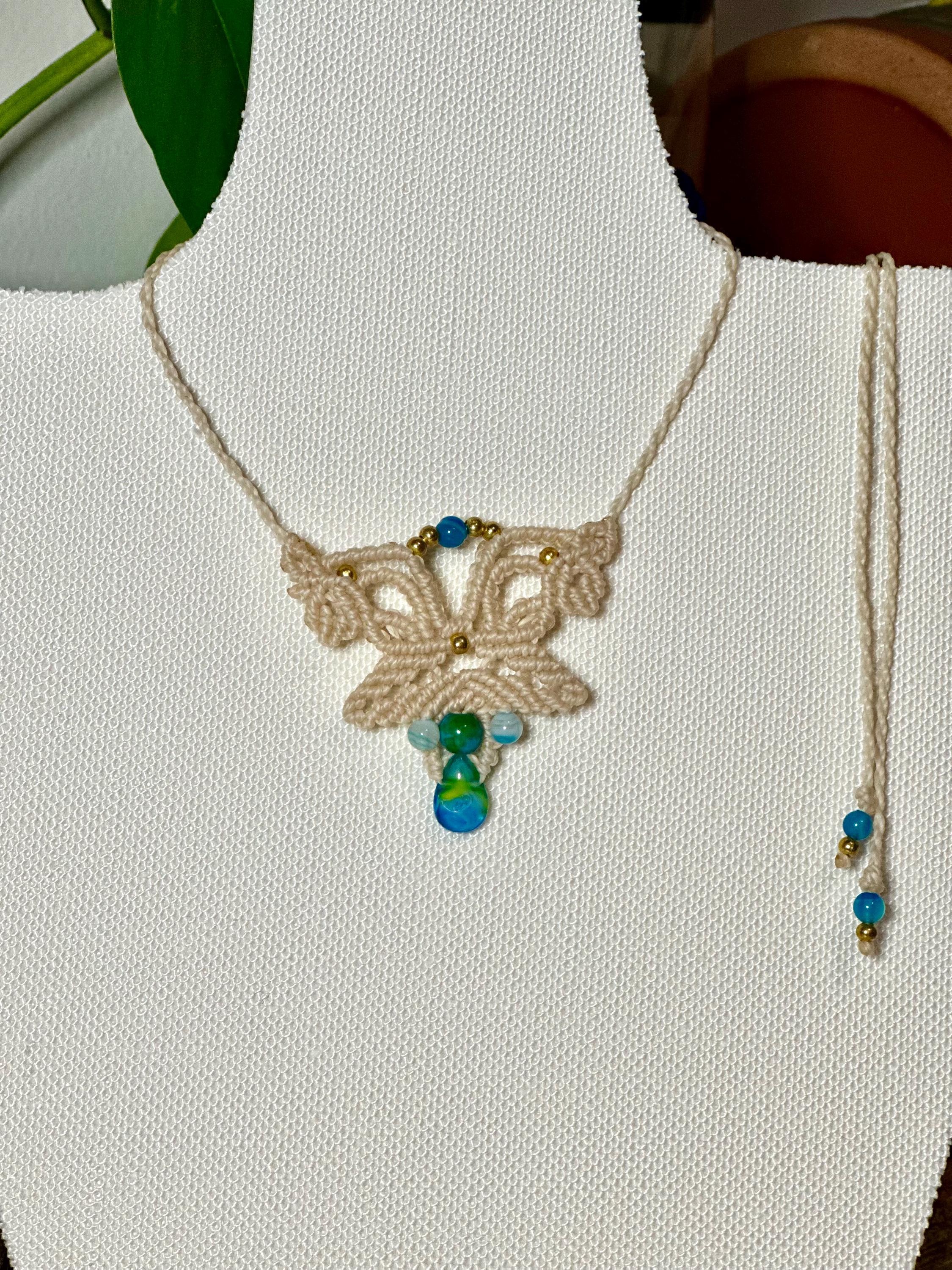 Handmade macrame necklace white with blue beads